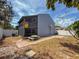 View of the backyard with patio, lanai, and sports equipment at 2930 S Pines Dr # 109, Largo, FL 33771