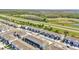 A high-angle shot of a townhome community located along a highway at 2949 Suncoast Plains Dr, Odessa, FL 33556
