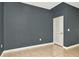 Bedroom with tile floors, baseboards, and neutral walls at 2949 Suncoast Plains Dr, Odessa, FL 33556
