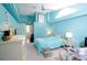 Calming bedroom with bright blue walls and lots of natural light, offers a serene retreat at 3051 Jodi Ln, Palm Harbor, FL 34684