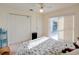 Bedroom featuring a sliding glass door leading to an outside patio area and backyard at 3051 Jodi Ln, Palm Harbor, FL 34684