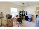 Bright office space featuring a large window for natural light and a ceiling fan for comfort at 3051 Jodi Ln, Palm Harbor, FL 34684