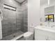 Modern bathroom featuring glass shower, marble vanity, and contemporary fixtures at 3105 S Schiller St, Tampa, FL 33629
