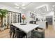 Elegant dining area featuring a wine cellar and contemporary lighting at 3105 S Schiller St, Tampa, FL 33629