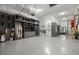 Spacious garage features extensive slat wall organizer system, surfboards and wakeboard at 3105 S Schiller St, Tampa, FL 33629