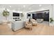 This bright living room with fireplace has sliding glass doors, seamlessly blending indoor and outdoor living at 3105 S Schiller St, Tampa, FL 33629