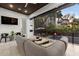 Inviting outdoor living space with comfortable seating overlooking a pool and lush backyard at 3105 S Schiller St, Tampa, FL 33629