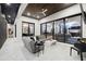 Beautiful outdoor living space with tile flooring, wood ceiling, and modern sectional at 3105 S Schiller St, Tampa, FL 33629