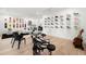 Spacious recreation room featuring an electric drum set, guitar, and displays of sneakers and skateboards at 3105 S Schiller St, Tampa, FL 33629