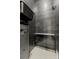 Modern storage room with slat walls and black shelving units at 3105 S Schiller St, Tampa, FL 33629