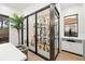 Beautiful wine cellar with a glass enclosure for storing wine bottles at 3105 S Schiller St, Tampa, FL 33629