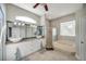 Bathroom with double sinks, a glass shower and tub at 3208 Stevenson St, Plant City, FL 33566