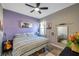 Bedroom with decorative picture frames and a ceiling fan at 3208 Stevenson St, Plant City, FL 33566