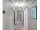 Hallway with three decorative picture frames at 3208 Stevenson St, Plant City, FL 33566