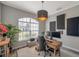Comfortable home office with natural light, a modern desk, and neutral decor at 3208 Stevenson St, Plant City, FL 33566
