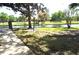 Backyard view of a canal with a sidewalk at 3358 Mermoor Dr # 2106, Palm Harbor, FL 34685