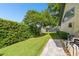 Well-maintained backyard featuring a lush lawn, mature trees, and a tranquil atmosphere at 3612 Sugar Loaf Ln, Valrico, FL 33596