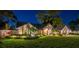 Attractive single-Gathering home with meticulously maintained landscaping, brick accents, and a welcoming front entrance at 3612 Sugar Loaf Ln, Valrico, FL 33596