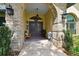 Covered front entry with brick detail and double doors at 3612 Sugar Loaf Ln, Valrico, FL 33596