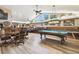 Large game room featuring a pool table, bar area, table seating and recessed lighting at 3612 Sugar Loaf Ln, Valrico, FL 33596