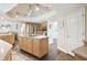 Bright kitchen features wood cabinets, an island cooktop and stainless steel appliances at 3612 Sugar Loaf Ln, Valrico, FL 33596