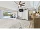 Lovely main bedroom featuring a ceiling fan, tv, and patio door at 3612 Sugar Loaf Ln, Valrico, FL 33596