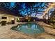 Lovely screened-in pool area with an inviting swimming pool, outdoor seating, and lush backyard views at 3612 Sugar Loaf Ln, Valrico, FL 33596
