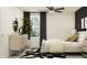 Stylishly furnished bedroom with ample natural light, neutral colors, and elegant decor accents at 3708 Forest Path Dr, Plant City, FL 33565