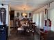 Elegant dining room with a chandelier and hardwood floors at 4116 Cardoon Dr, New Port Richey, FL 34653