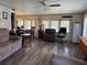 Inviting living room featuring hardwood floors and a cozy atmosphere at 4116 Cardoon Dr, New Port Richey, FL 34653