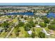 Aerial view showcasing waterfront property's prime location within a charming neighborhood at 609 4Th Sw Ave, Ruskin, FL 33570