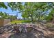 Inviting backyard fire pit with seating area, perfect for outdoor entertaining at 609 4Th Sw Ave, Ruskin, FL 33570