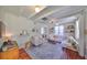 Spacious living room featuring comfortable seating, natural light, and stylish décor at 609 4Th Sw Ave, Ruskin, FL 33570