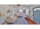 Inviting living room with ample seating, natural light, and stylish decor at 609 4Th Sw Ave, Ruskin, FL 33570