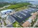 A marina showcases a beautiful array of boats docked amidst the serene waterway under a partly cloudy sky at 803 Bahia Del Sol Dr # 66, Ruskin, FL 33570