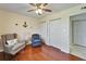 Bedroom with hardwood flooring, ceiling fan, and two closets featuring closet storage at 803 Bahia Del Sol Dr # 66, Ruskin, FL 33570
