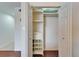 Open white closet with shelving, drawers, and hanging space for optimal organization at 803 Bahia Del Sol Dr # 66, Ruskin, FL 33570