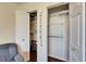 Two walk-in closets with white doors, wire shelving and rack and ocean-themed decorations at 803 Bahia Del Sol Dr # 66, Ruskin, FL 33570