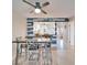 The dining area is adjacent to the kitchen in an open concept living space at 803 Bahia Del Sol Dr # 66, Ruskin, FL 33570