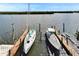 Private dock featuring boat lifts offers easy access to open bay and waterfront activities at 803 Bahia Del Sol Dr # 66, Ruskin, FL 33570