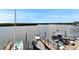 Expansive private dock featuring boat lifts provides direct access to the open bay waters at 803 Bahia Del Sol Dr # 66, Ruskin, FL 33570