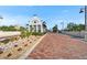 Entrance to Little Harbor community with brick paved drive and landscaped beds at 803 Bahia Del Sol Dr # 66, Ruskin, FL 33570