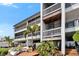 Attractive exterior showcasing a condo complex with private balconies and scenic waterfront views at 803 Bahia Del Sol Dr # 66, Ruskin, FL 33570