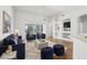 Bright living room with hardwood floors, recessed lights, and glass doors to screened patio at 8847 Bel Meadow Way, Trinity, FL 34655
