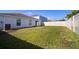 Well-maintained, fenced backyard provides a secure and private outdoor area at 1506 Climbing Dayflower Dr, Ruskin, FL 33570