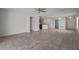 Open living area with tile flooring that seamlessly connects to the kitchen, creating an inviting space at 1506 Climbing Dayflower Dr, Ruskin, FL 33570