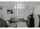 Inviting living room with high ceilings, a decorative chandelier, and plenty of natural light at 10275 Oasis Palm Dr, Tampa, FL 33615