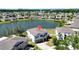 Aerial view of property showcasing the lake view and neighborhood at 10612 Strawberry Tetra Dr, Riverview, FL 33578