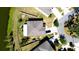 An aerial view of the home showcasing the roof and the backyard at 10612 Strawberry Tetra Dr, Riverview, FL 33578