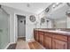 Full bathroom with granite countertops and double sinks at 10612 Strawberry Tetra Dr, Riverview, FL 33578